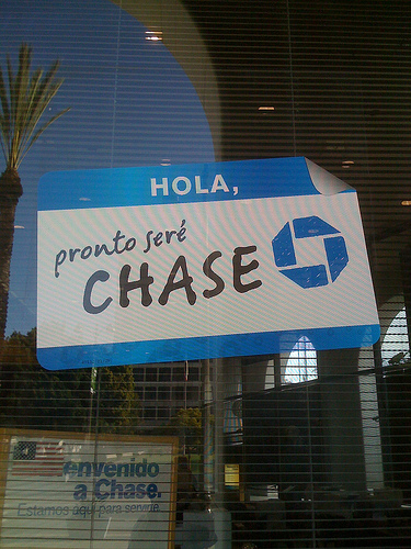 Spanish sign of Washingtong Mutual becoming Chase Bank